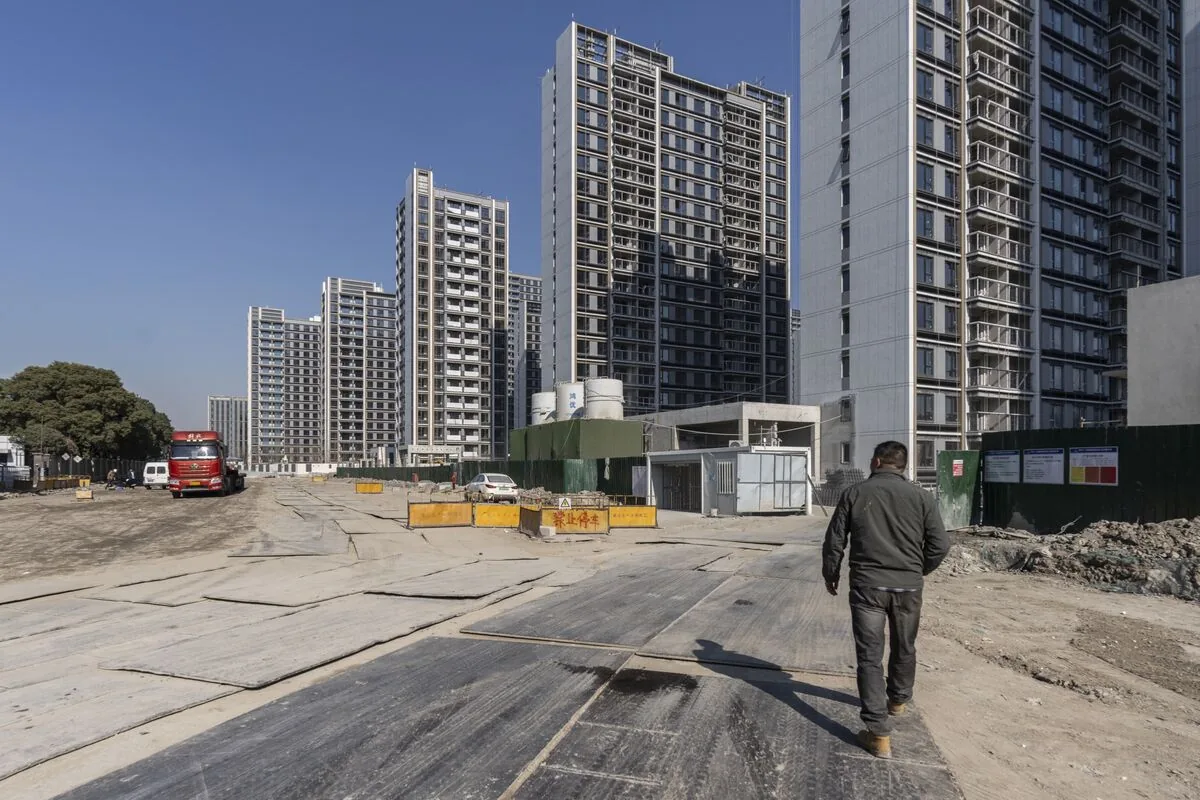 China Real Estate Stocks Surge After Ministry Declares ‘Stock Housing Era’ Shift