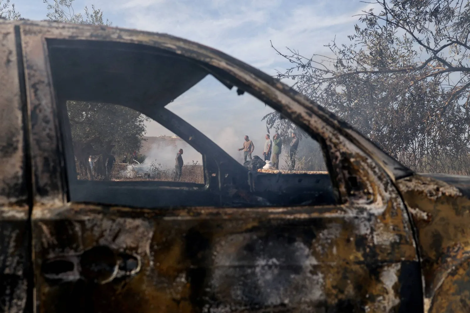 Israeli settlers attack Palestinian olive harvest and Washington Post photographer in West Bank