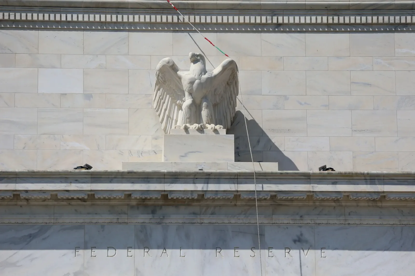 Traders hedge against Fed delivering fewer rate hikes than market prices in