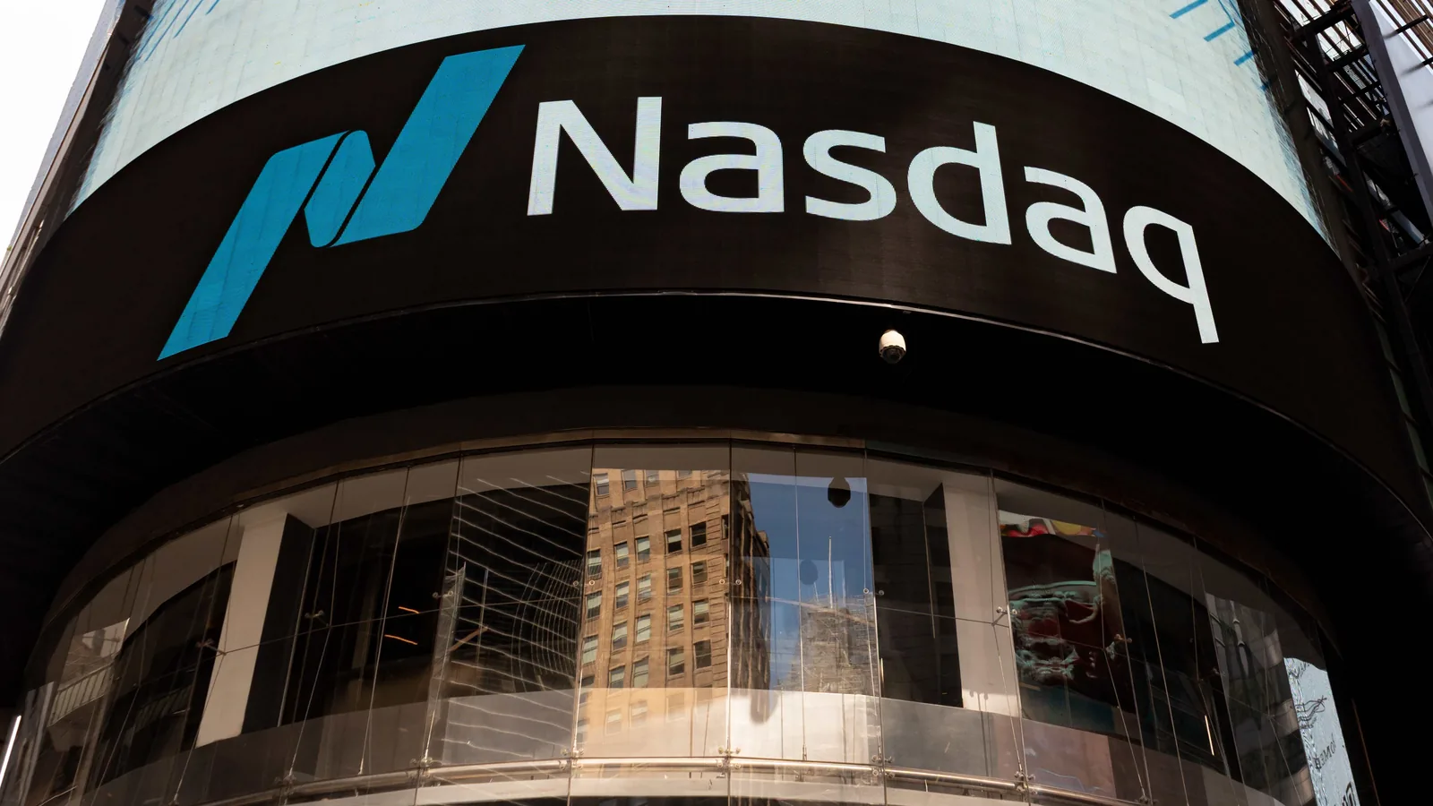 Nasdaq hits record high on AI rally; PBOC pledges monetary easing for growth